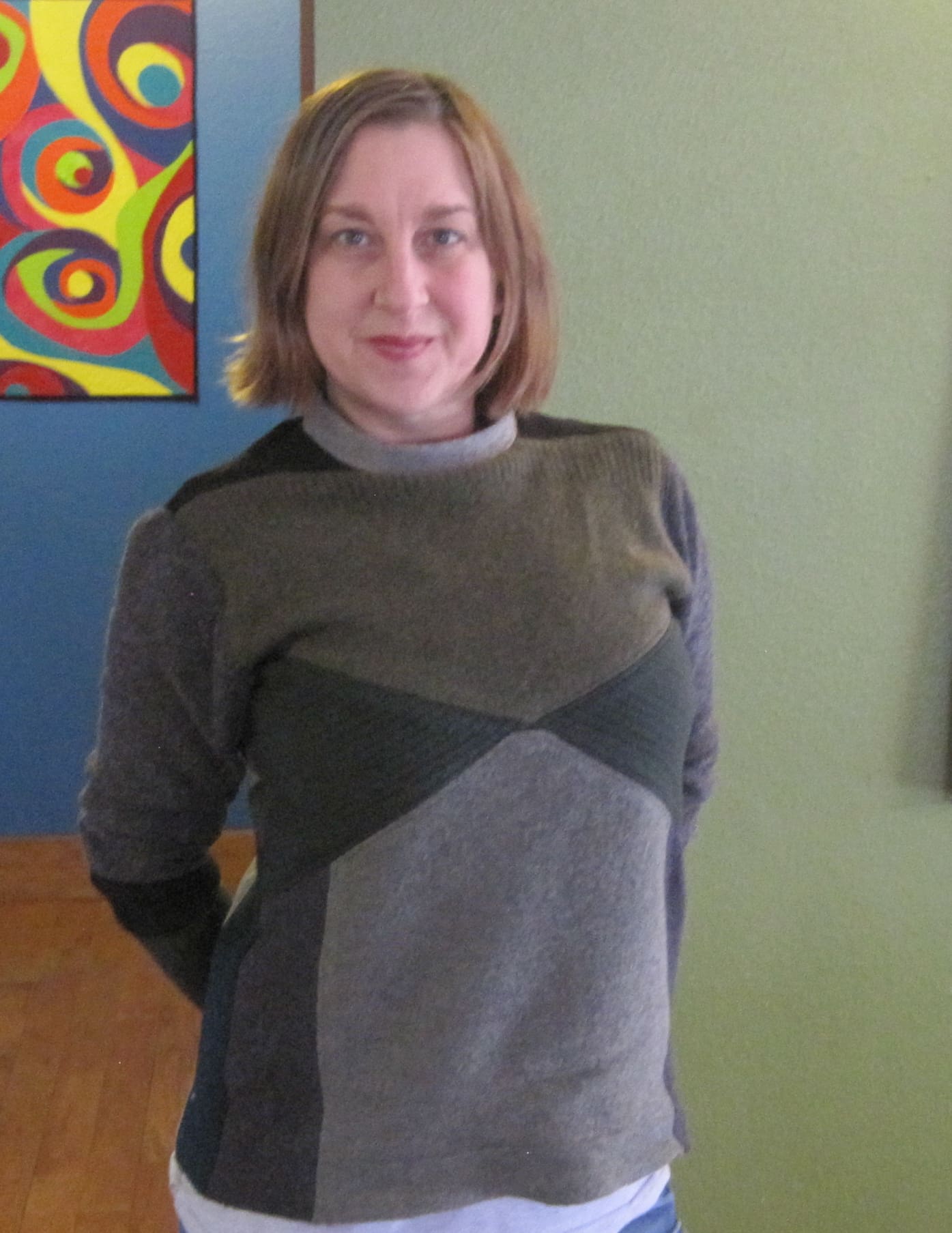 I love the color, design, and feel of this sweater.