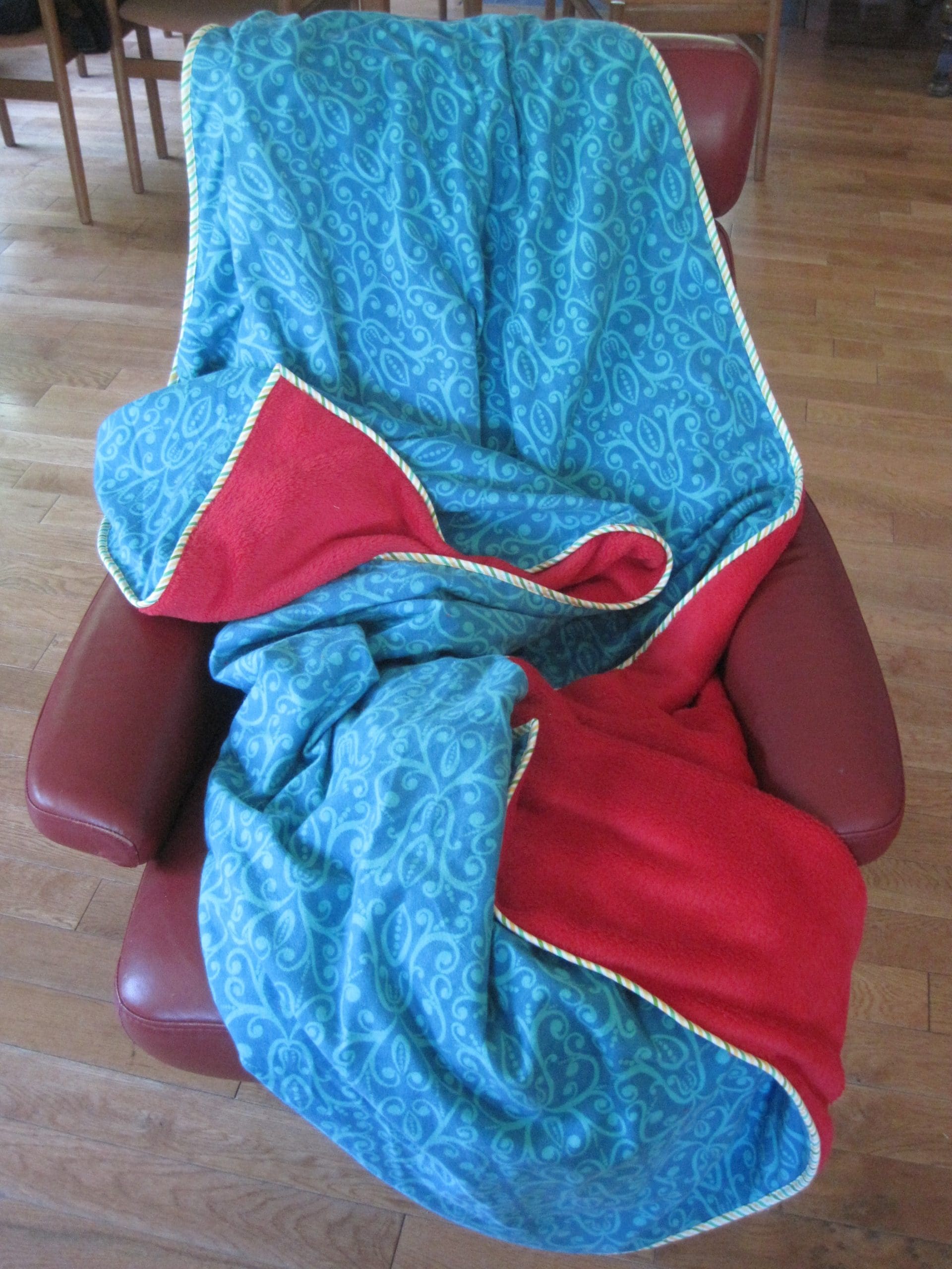 Of course, blankets are never folded up at my house. this is usually what they look like.